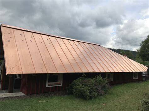 House Raynham měděná střecha u oceánu